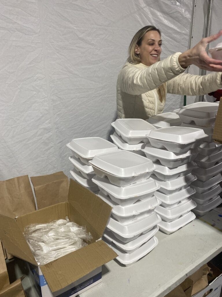 Meredith setting up the dinner station