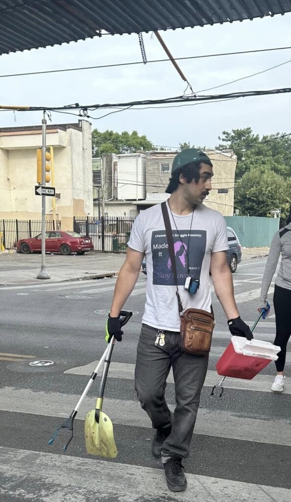 Adam Al-Asad with the clean up crew