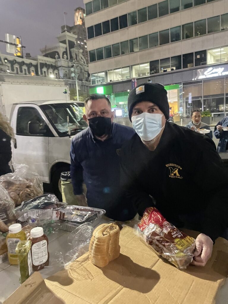 Jeff Kantowski and Paul making sandwiches